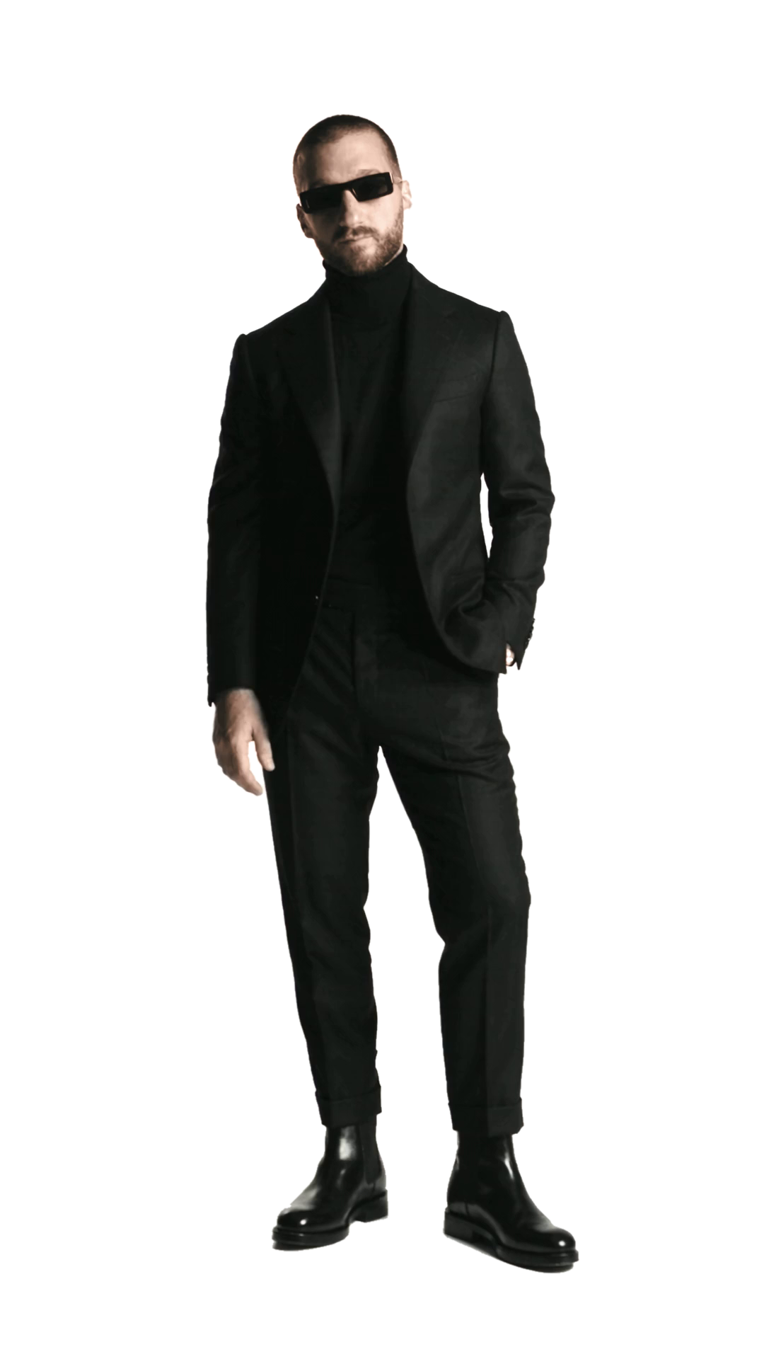 Arthur Rozon in a black suit and turtleneck