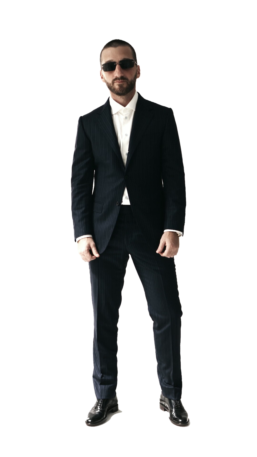 Arthur Rozon in a tailored navy suit